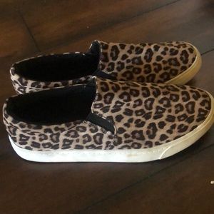 Worn once cheetah sneakers. Size 9!